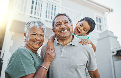 Buy stock photo Portrait, piggyback and happy grandparents with a child in the backyard of their family home. Happiness, smile and elderly man and woman in retirement bonding with their grandson outdoor their house.