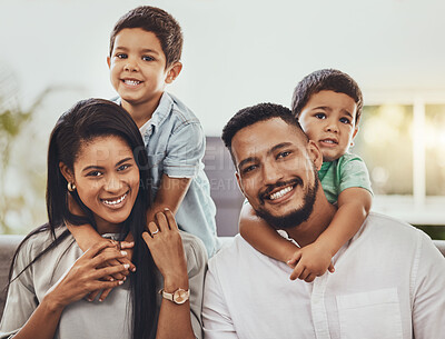 Buy stock photo Mother, father and children hugging parents with smile relaxing together for holiday or weekend at home. Portrait of happy mom, dad and kids smiling for hug, love or care in relax for family time