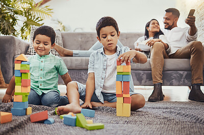 Buy stock photo Family, toys and living room floor fun of children doing a learning knowledge development activity. Watching tv, parents and kids at home with love and care together building blocks for education
