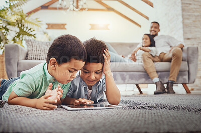 Buy stock photo Tablet, children on carpet and family relax on sofa for home internet, elearning development app or online games. Kids on ground or floor and digital technology for youth website and parents on couch