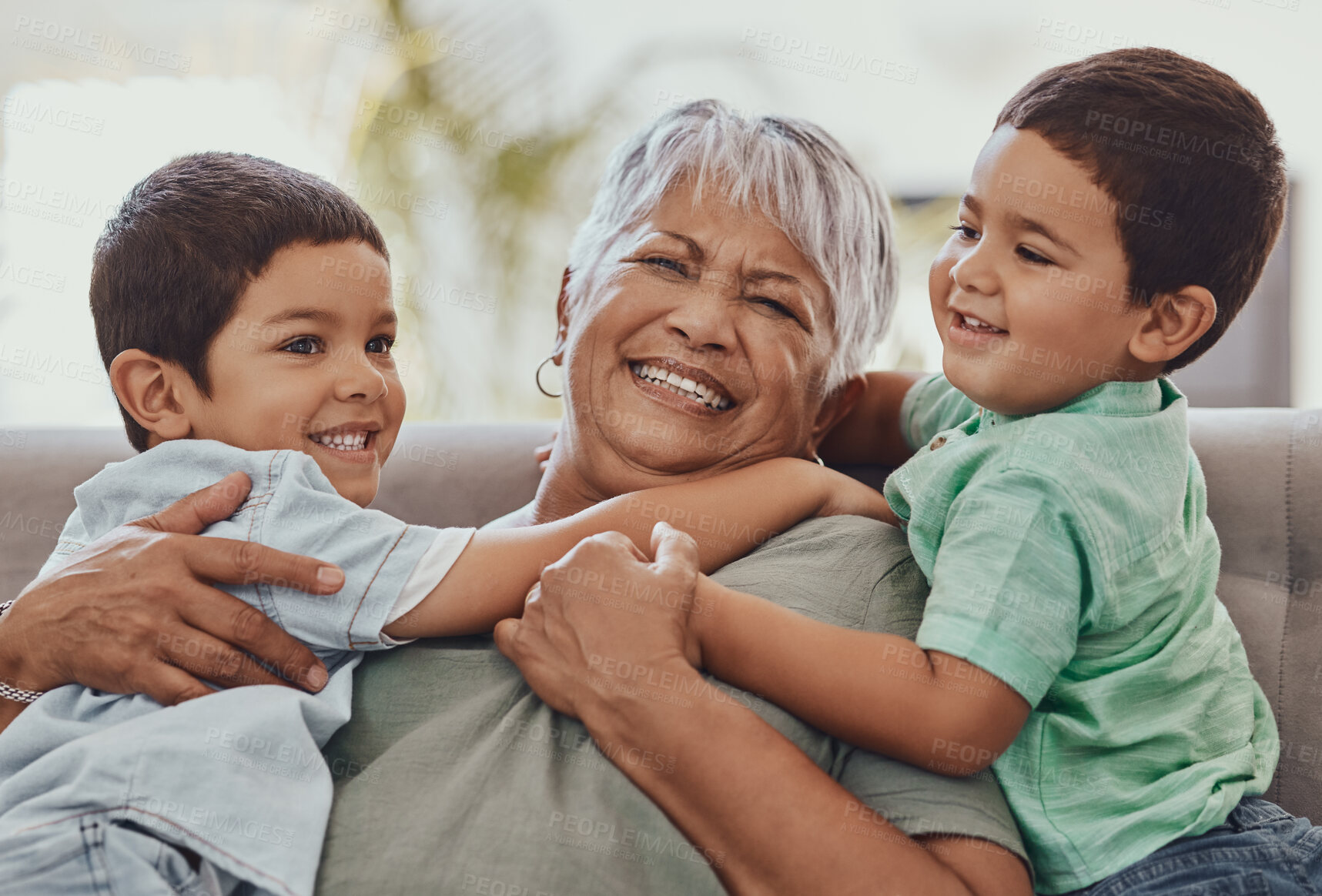 Buy stock photo Love, grandmother and boys on couch, smile and playful on weekend, bonding and loving together. Granny, grandkids and male grandchildren on sofa in lounge and happiness on summer vacation or carefree