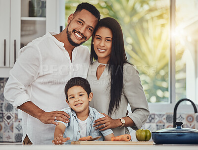 Buy stock photo Cooking, smile and portrait of family in kitchen for health, nutrition and diet wellness. Happy, bonding and food with parents and child at home for with vegetables for learning, growth and help 