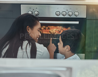 Buy stock photo Cooking, kid learning and stove food check with mother and child ready for teaching at home. Mom, boy and morning breakfast with happiness and parent care with happy young person helping mama