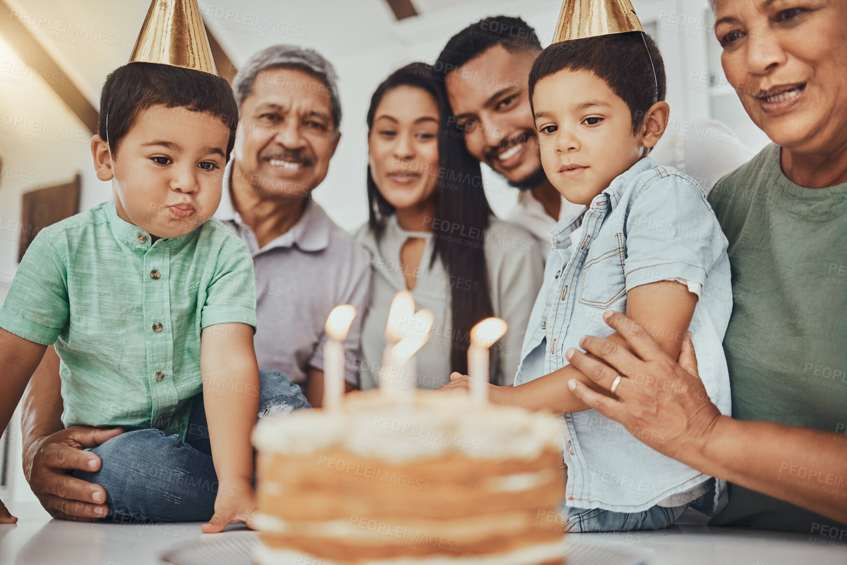 Buy stock photo Birthday, family and children with parents and grandparents in a kitchen for cake, celebration and bonding. Party and kids with mother and father, happy and smile with grandmother and grandpa