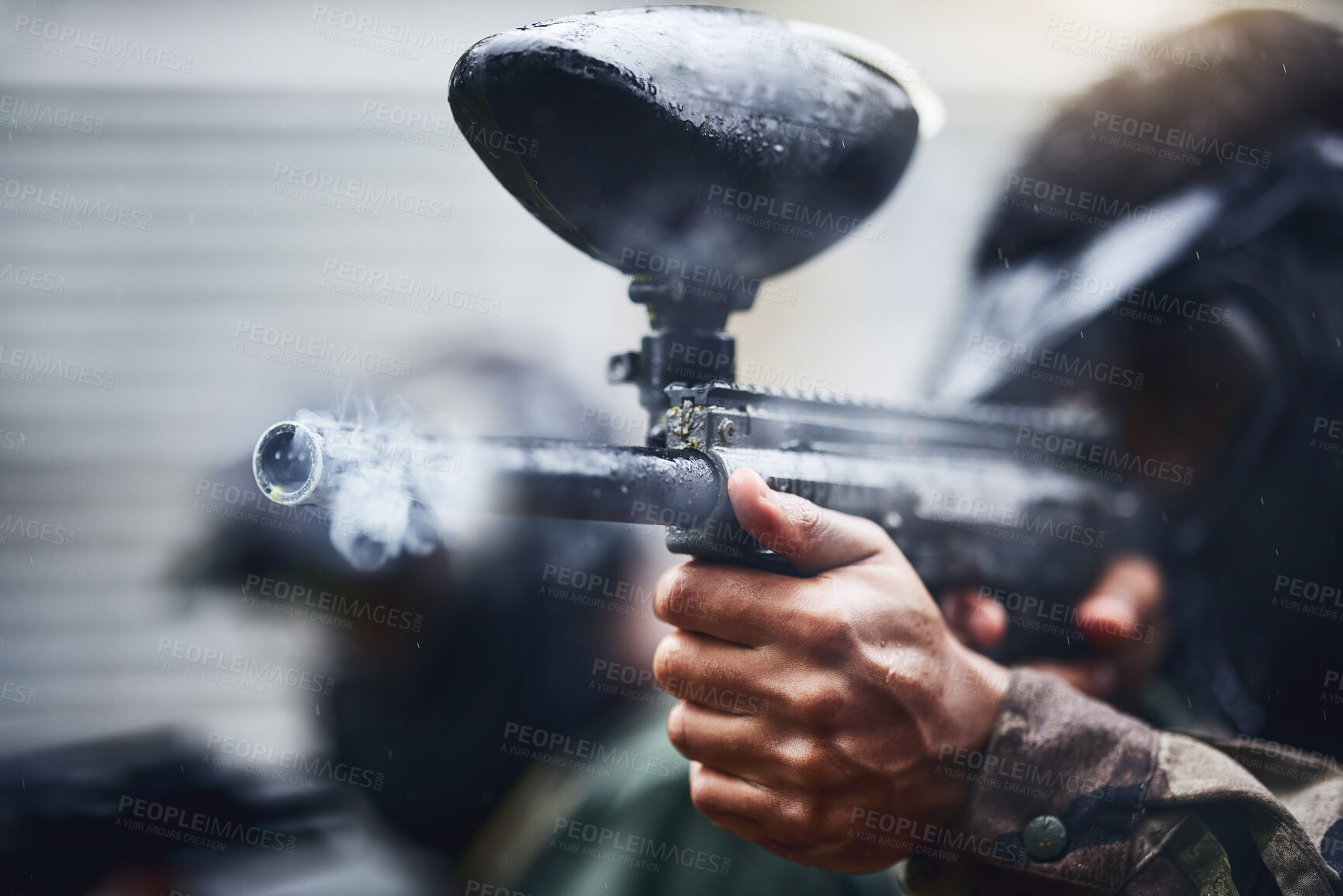 Buy stock photo Hand, paintball and gun with a sports man playing a military game for training or fun outdoor. Fitness, exercise and safety with a male player using a marker to shoot during a competitive tournament