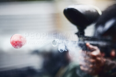 Buy stock photo Closeup, person and paintball gun shooting with ball for fun, extreme and sport, fitness and training. Zoom, marker, and target, practice and game with people competing, speed and power