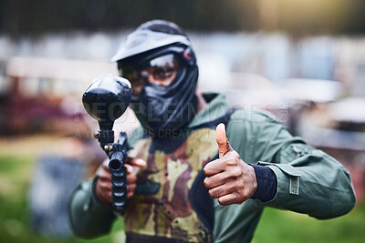 Buy stock photo Paintball gun, man and portrait with mask, camouflage clothes and thumbs up to start outdoor combat game. Helmet head, war games and adventure for training, shooting or tactical development training