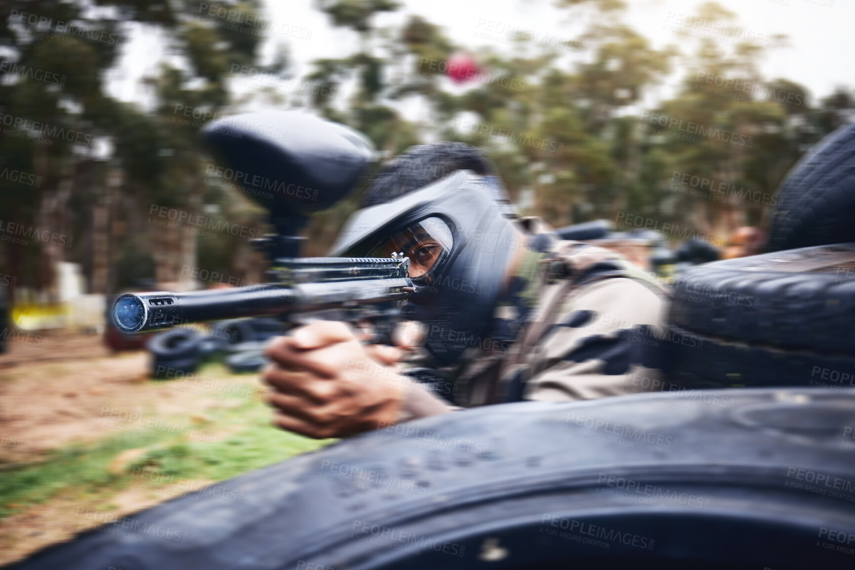 Buy stock photo Paintball, gun or man playing a shooting game with fast action on a fun battlefield on holiday. Military mission, fitness or player aiming with weapons gear for war survival in an outdoor competition