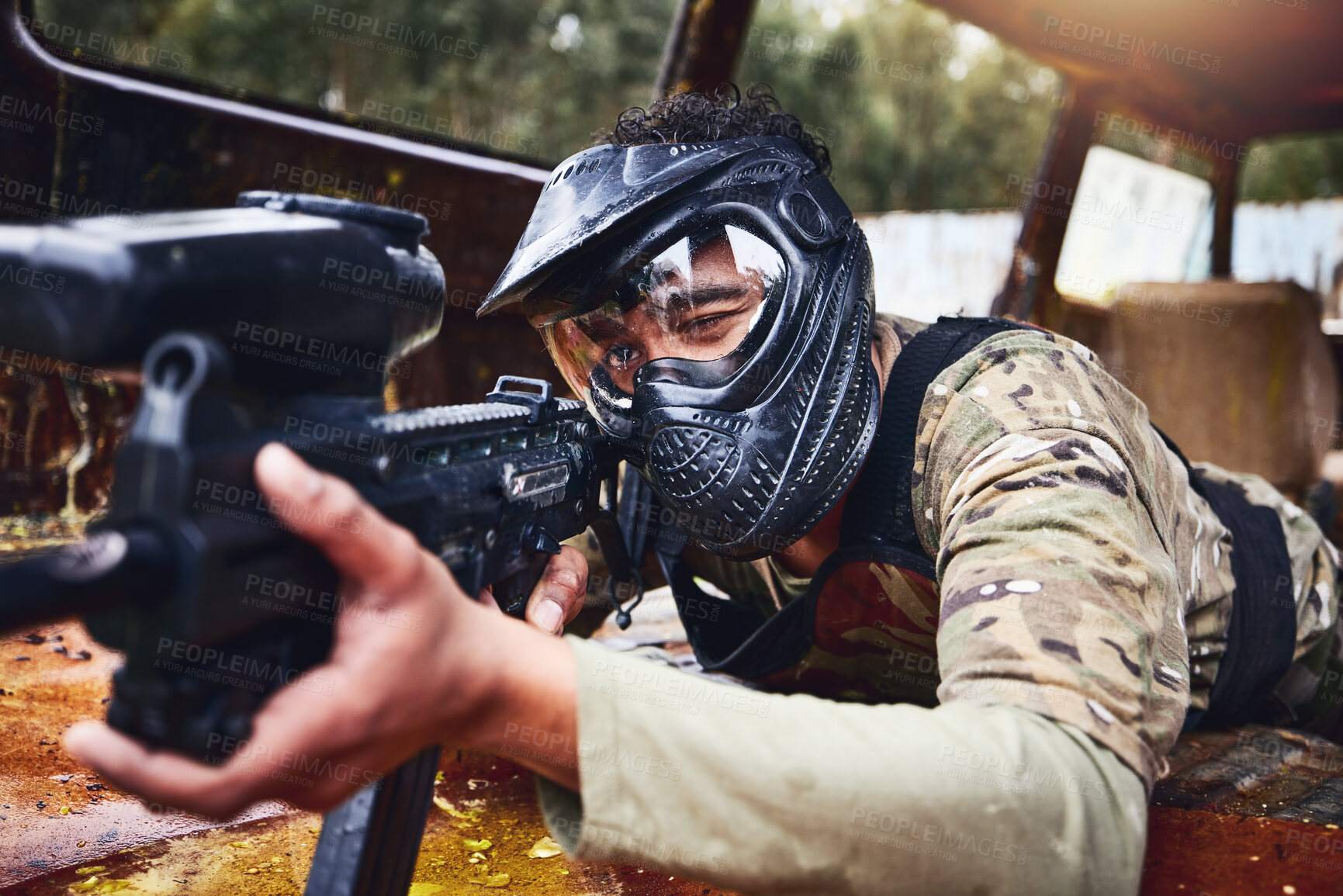 Buy stock photo Paintball, gun or soldier in a shooting game with fast action on a fun battlefield on holiday. Military mission, target or focused man with war weapons gear for survival in an outdoor competition