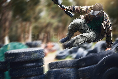 Buy stock photo Fast, moving and man playing paintball with action, military clothes and running during a game in Australia. War, sport and person with blurred motion during a fun, playful and outdoor competition