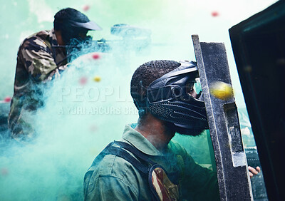 Buy stock photo Paintball team, shooting together and war game with shield, mask or tactical strategy for safety, competition or contest. Outdoor teamwork, team building and vision with weapon, combat and friends