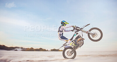 Buy stock photo Motorbike, motorcycle athlete and desert drive with mockup cycling in nature for sport adventure. Jump, freedom and sports driving training of a man with speed on sand trail for fitness and exercise