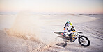 Bike, sand landscape or man speed on motor cross for sport workout, sunset ride or exercise on hill. Nature, sky or man riding for speed adventure in Dubai desert for training, fitness or race energy