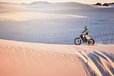 Buy stock photo Desert, moto cross and extreme motorbike sport of a man on sand dunes in Africa doing fitness. Driving challenge, beach adventure and cycling travel of a athlete in nature training for moto cross 