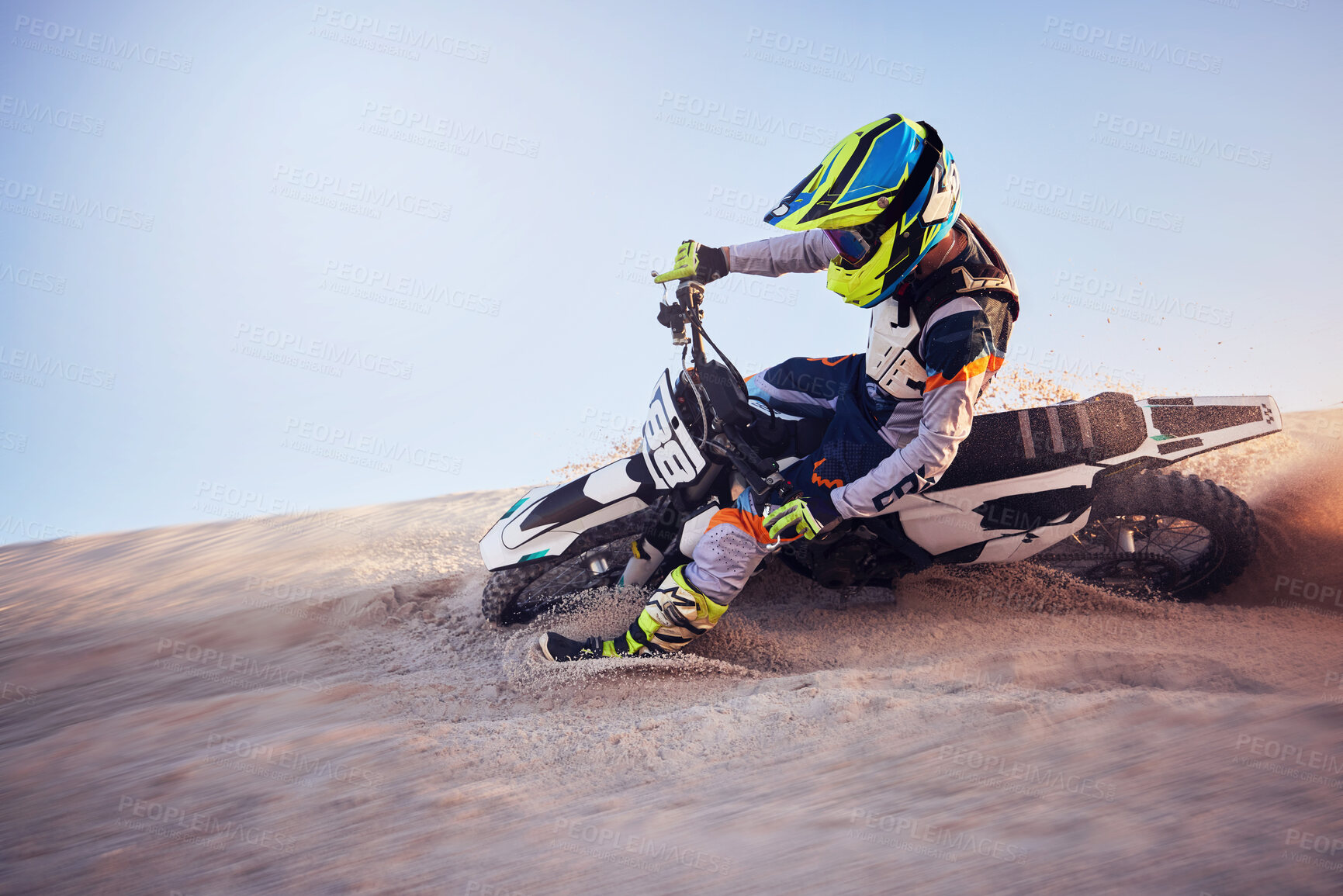 Buy stock photo Moto cross, sand hill or man on bike for extreme sport workout, sunset ride or exercise on dirt. Nature, sky or person riding for speed adventure in Dubai desert for training, fitness or race