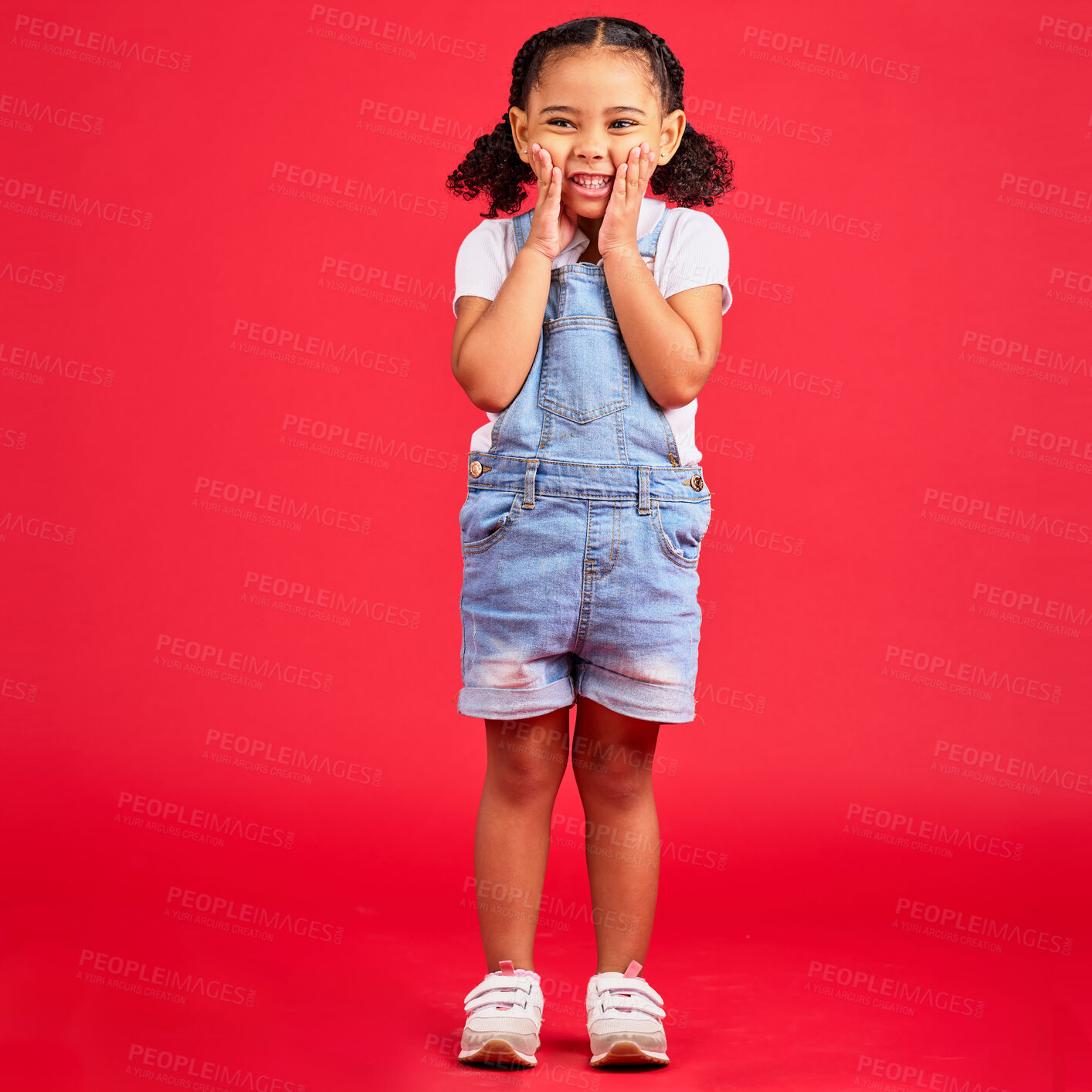 Buy stock photo Happy, youth and portrait of girl on red background for happy childhood, positive mindset and smile. Fashion, summer style and cute face of girl in studio with funny, comic and meme facial expression