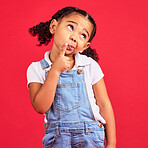 Child, face or thinking finger on chin on isolated red background in games innovation, question or planning vision. Little girl, kid or curious expression in ideas, fashion clothes or curly hairstyle