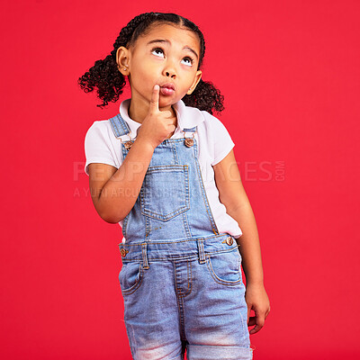 Buy stock photo Kid, face or thinking finger on chin by isolated red background in games innovation, question or planning vision. Little girl, ideas or curious expression for child fashion clothes or curly hairstyle