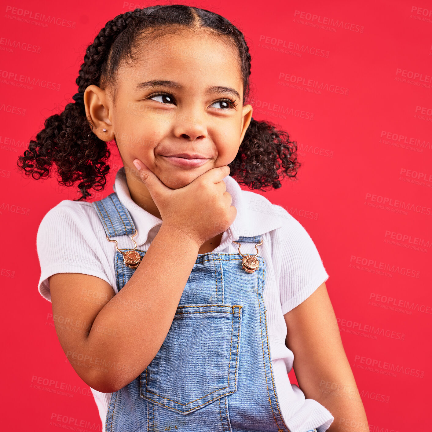 Buy stock photo Little girl, face or thinking hand on chin on isolated red background in games innovation, studio question or fun vision. Smile, happy or curious child with ideas, fashion clothes or curly hair style