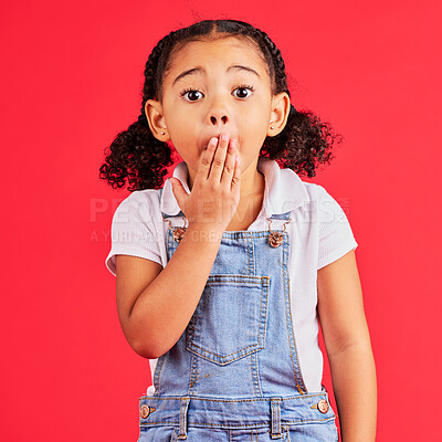 Buy stock photo Shocked kid, portrait and hand on mouth in secret, oops and mistake facial expression on isolated red background. Child, little girl and surprised face in gossip, news or emoji at studio announcement