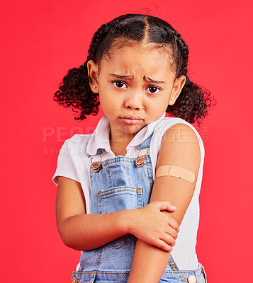 Buy stock photo Child portrait, sad and arm plaster in covid vaccine, injection and fall injury on isolated red background. Upset, unhappy and hurt girl and bandage in medical help, healthcare wellness and first aid