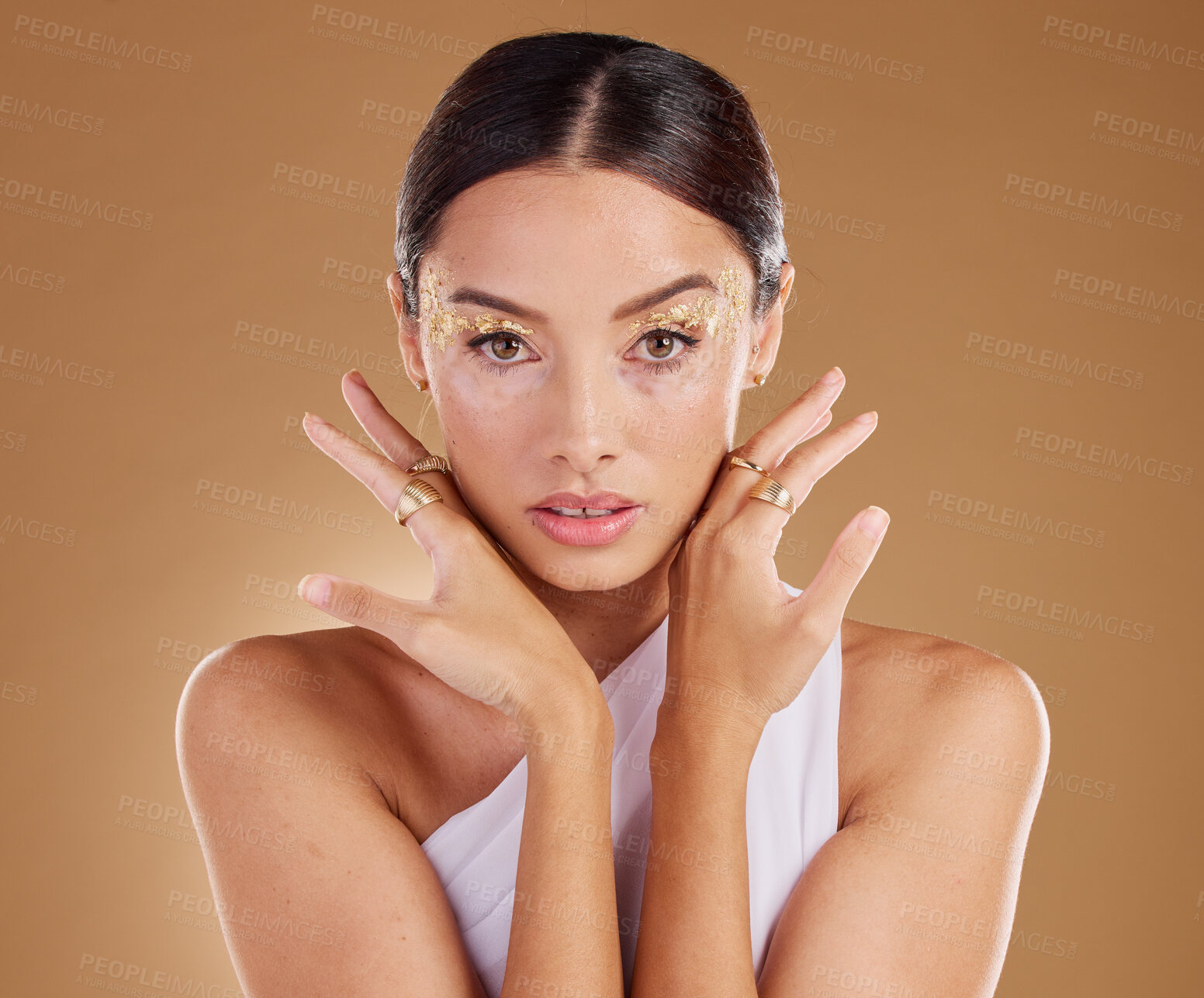 Buy stock photo Gold portrait, glitter makeup or woman with luxury eyeshadow, cosmetics product and skincare glow. Beauty girl, spa salon or aesthetic model face with jewelry ring, accessories or vitiligo healthcare