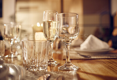 Buy stock photo Drink, glass and dinner with party, celebration event with glassware, elegant and luxury in restaurant or banquet. Table setting, alcohol and lifestyle, fine dining with decoration and celebrate