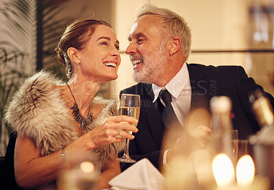 Buy stock photo Happy, senior and couple celebration dinner with wine glass and smile of woman with funny man. New years party with mature guests smiling together for joke in elegant, classy and formal style.