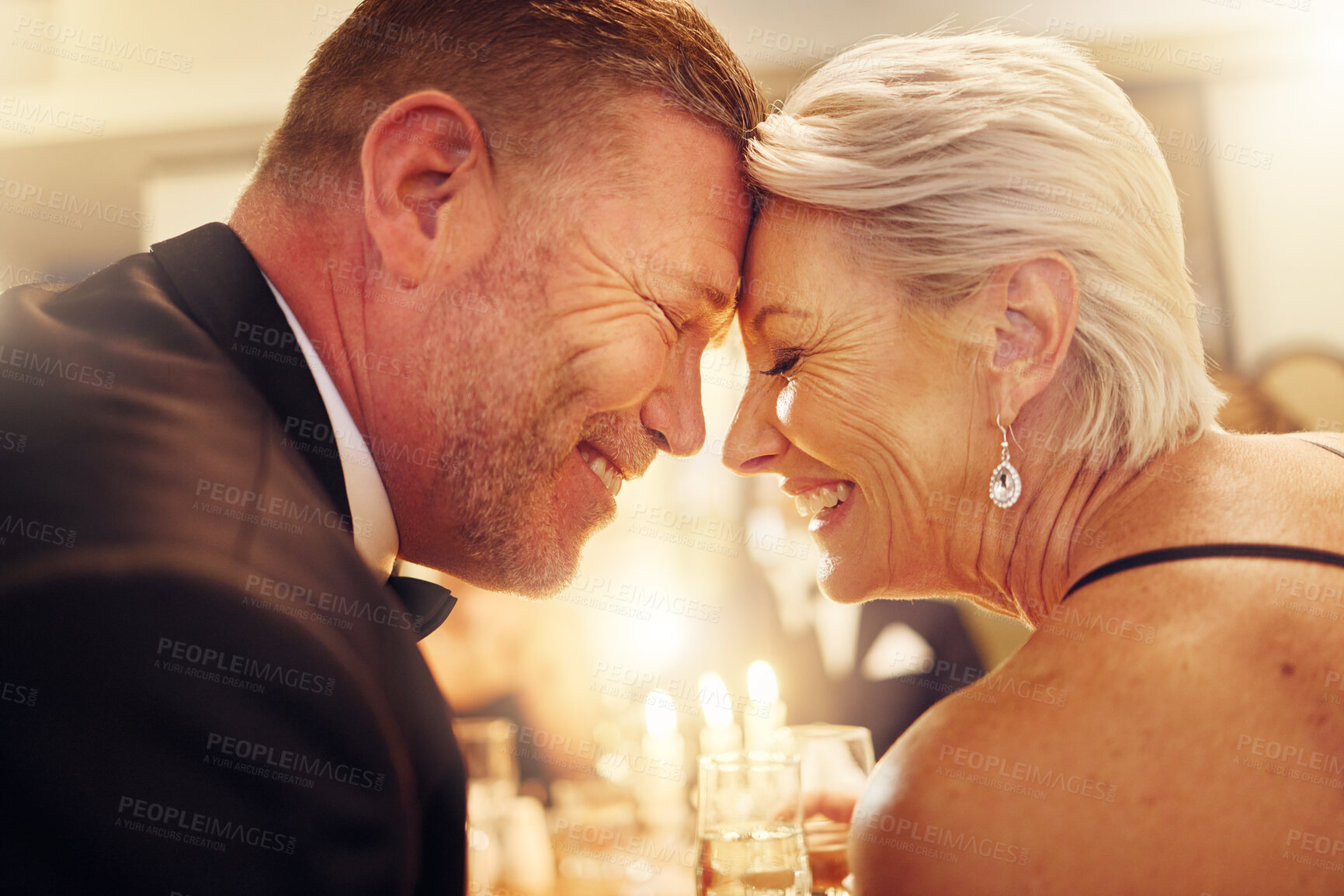 Buy stock photo Love, forehead or senior couple in a party in celebration of goals or new year at luxury social event. Romance, happy woman or romantic man smiles enjoy an embrace or bonding at dinner gala together