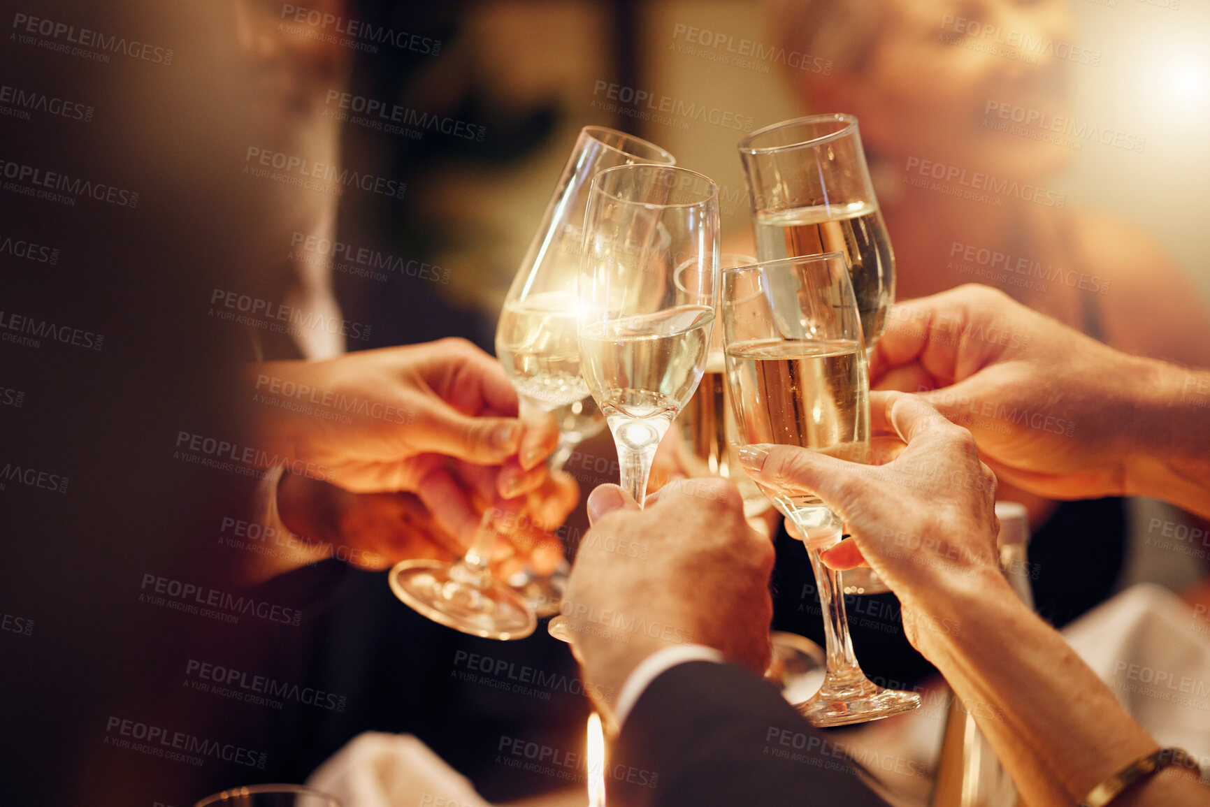 Buy stock photo Success, hands or toast in a party for goals, winning deal or new year at luxury social event celebration. Motivation, team work or people cheers with champagne drinks or wine glasses at dinner gala