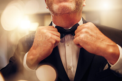 Buy stock photo Hands, fix bowtie and tuxedo for party, event or celebration gala in night for formal fashion. Senior man, evening clothes and designer suit by blurred background to ready for new years eve in mirror