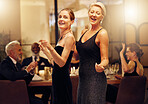 Dance, singing and portrait of women at an event for new years, birthday celebration or party. Smile, happy and mature, elegant and classy friends at a social gala for dancing and to sing at a venue