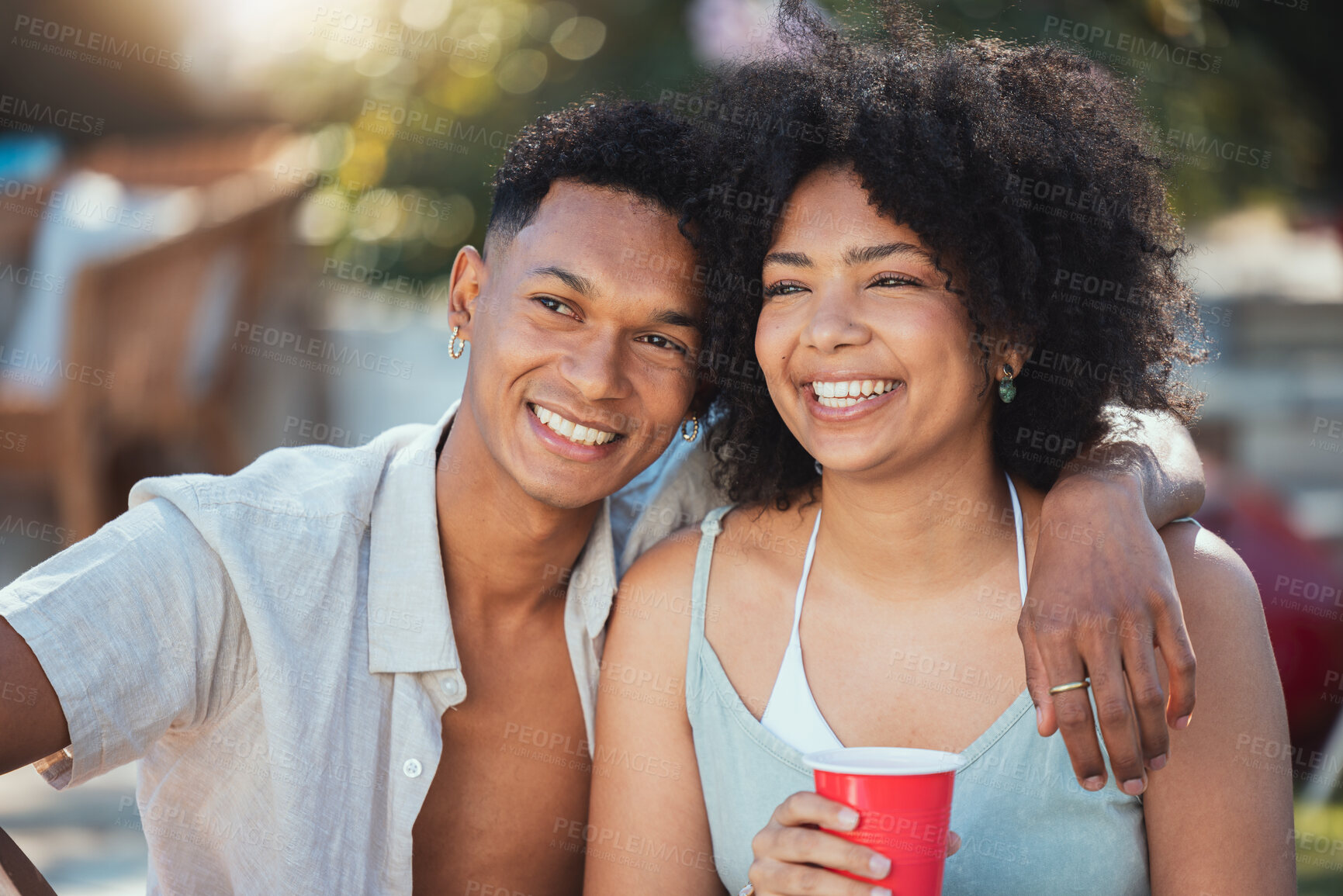 Buy stock photo Selfie, party and drinking with a black couple outdoor together at a celebration event in summer. Happy, smile and love with a young man and woman enjoying alcohol at a birthday or social gathering