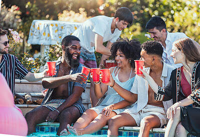 Buy stock photo Friends, pool party and cheers on summer vacation with happy people drinking and laughing with feet in water. Friendship, diversity and fun smile in sun, men and women relax and celebrate together.