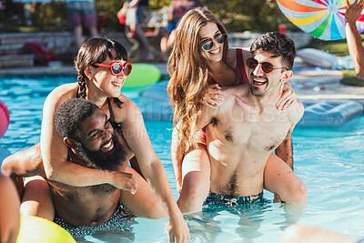 Buy stock photo Party, pool and piggyback with a couple of friends having fun while swimming together outdoor during summer. Water, swim and diversity with a man and woman friend group playing games outside