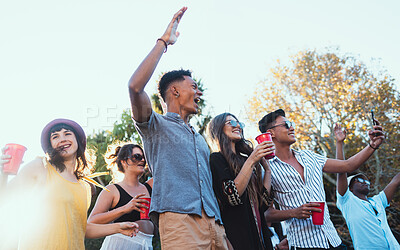 Buy stock photo Drinks, party and a crowd of friends outdoor to celebrate at  festival, concert or summer social event. Diversity young men and women people together while dancing, happy and excited with alcohol