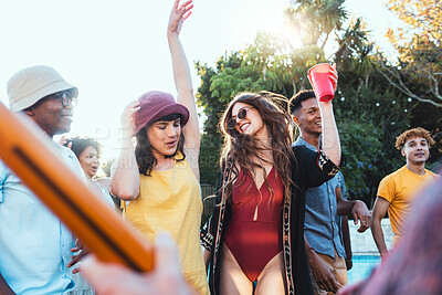 Buy stock photo Pool party, drinks and group of friends outdoor to celebrate at festival, location or summer social event. Diversity young men and women people together while dancing, happy and drinking alcohol