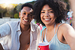 Selfie, party and summer with a black couple having fun outdoor while drinking at a celebration event. Love, alcohol and portrait with a young man and woman outside together at a birthday or social