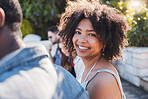Happy, smile and portrait of a black woman at a party to relax with friends on a holiday in Miami. Summer, young and face of an African girl on vacation with a group of people for travel together