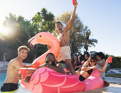 Buy stock photo Pool party, beer and friends on flamingo, having fun and partying. Summer celebration, water event and group portrait of drunk funny people laughing with alcohol, swimming and floating on bird float.
