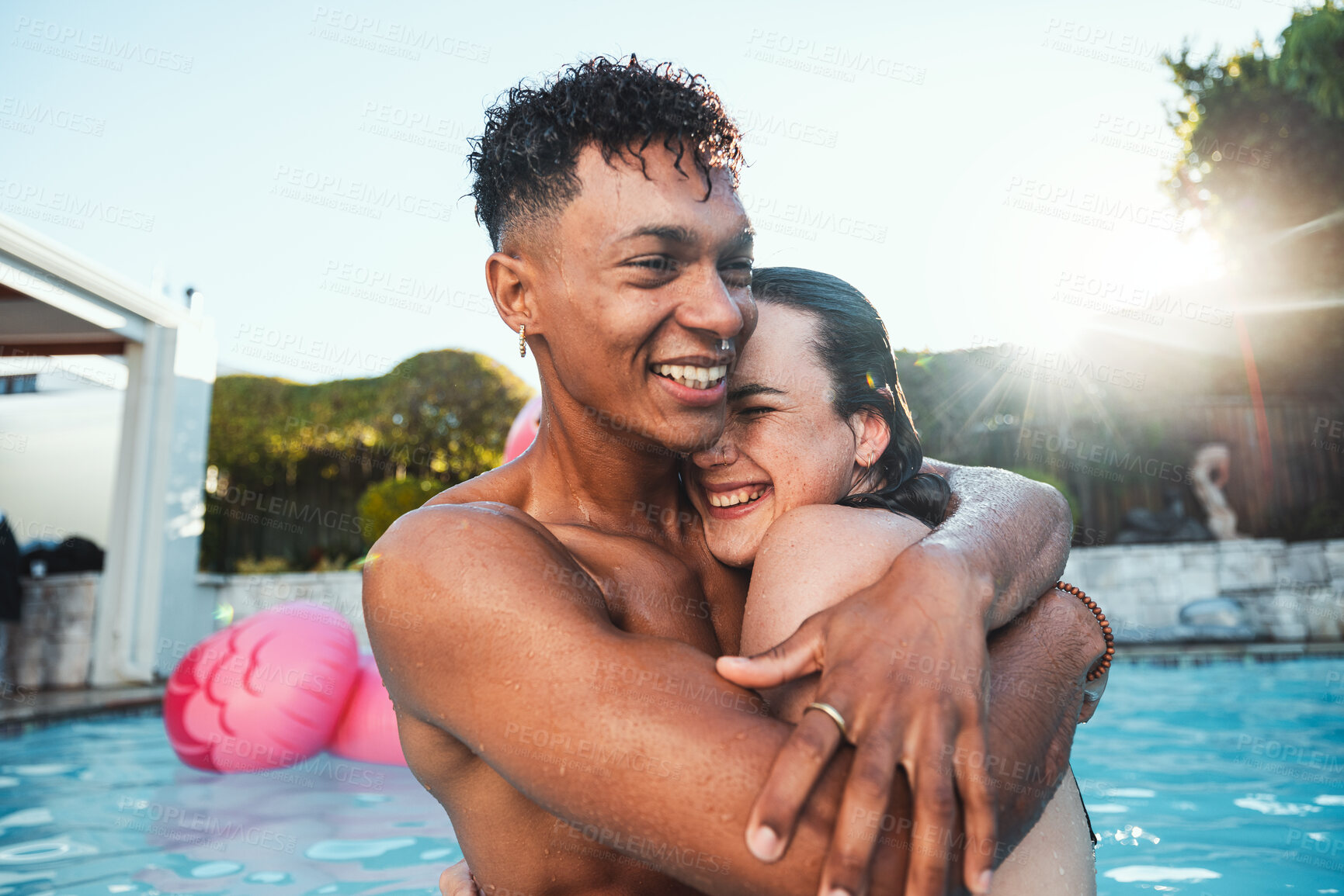 Buy stock photo Love, pool party and couple hug, having fun and bonding together. Swimming, romance diversity and happy man and woman hugging, cuddle or laugh at funny joke in water at summer event or celebration.