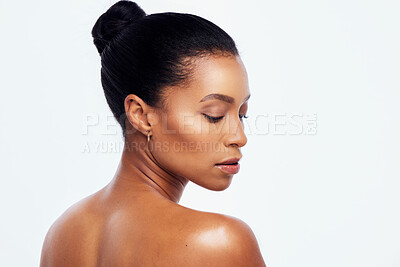 Buy stock photo Beauty, skincare and back of black woman in studio for wellness, healthy body and dermatology. Self care, spa aesthetic and girl profile with cosmetics, glowing and natural skin on white background