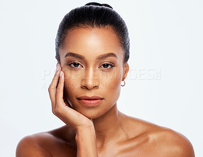 Buy stock photo Black woman, portrait and natural skincare in studio, isolated white background and beauty salon. Serious female model, face and cosmetics for aesthetic makeup, dermatology or healthy facial wellness