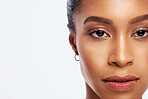 Portrait, black woman and skincare mockup in studio, white background and isolated space. Serious female model face, facial beauty and cosmetics for dermatology, aesthetic makeup and salon wellness 