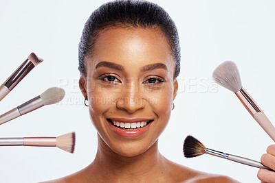 Buy stock photo Beauty, makeup and brush for face of woman portrait in studio for dermatology and cosmetics. Happy aesthetic model person with facial tools for a healthy skin glow isolated on a white background