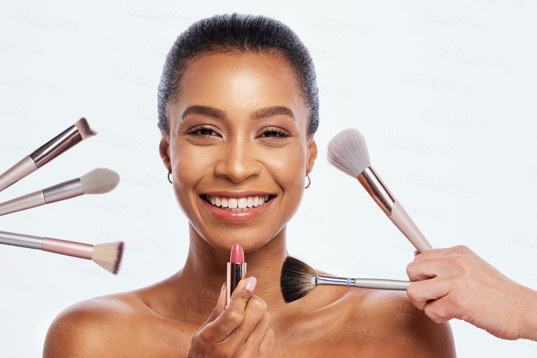 Buy stock photo Makeup, beauty brush and lipstick on face of woman portrait in studio for dermatology cosmetics. Happy aesthetic model person with facial tools for healthy skin glow isolated on a white background