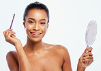 Makeup, portrait and black woman with eyebrow brush and mirror using cosmetic product isolated in studio white background. Face, dermatology and model with elegant and smooth skin as self care