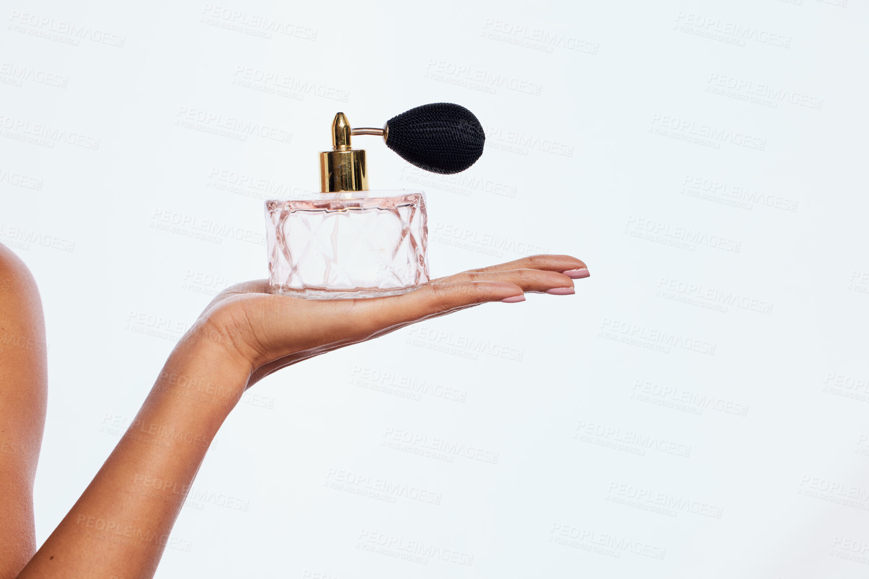 Buy stock photo Black woman, hands and luxury perfume for skincare, beauty wellness and fragrance in white background studio. African model hand, salon product mockup and cosmetics parfum isolated for advertising 