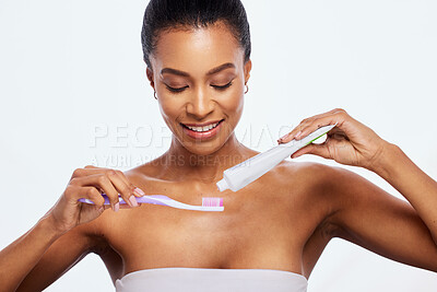 Buy stock photo Dental hygiene, grooming and woman brushing teeth isolated on white background in a studio. Health, cleaning and model with toothpaste and a toothbrush for a healthy mouth and oral care on a backdrop