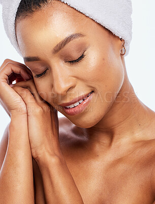 Buy stock photo Hair care, towel and black woman in studio, white background and isolated facial beauty. Model face, shower and head cloth for happy skincare, relax and smile for body dermatology, wellness and glow